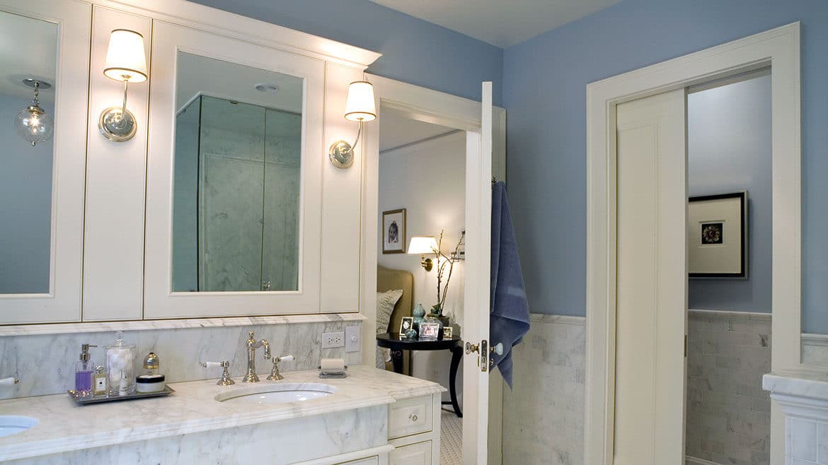 Winnetka Historic Renovation Master Bathroom Pocket Doors White Marble Double Vanities