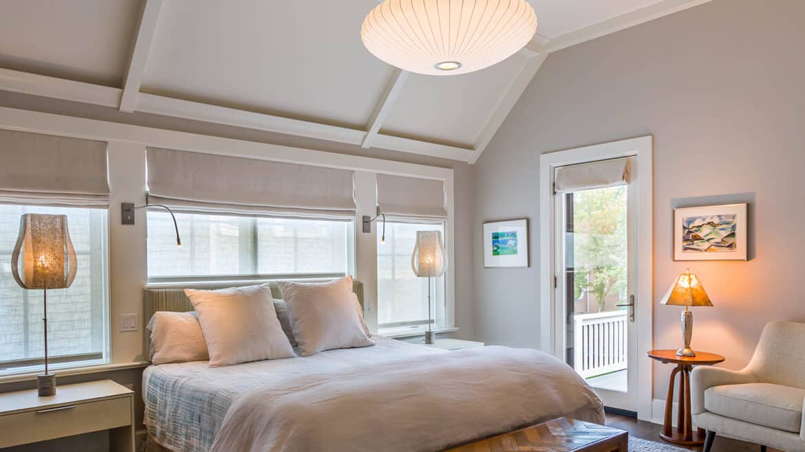 modern farmhouse master bedroom with vaulted ceiling