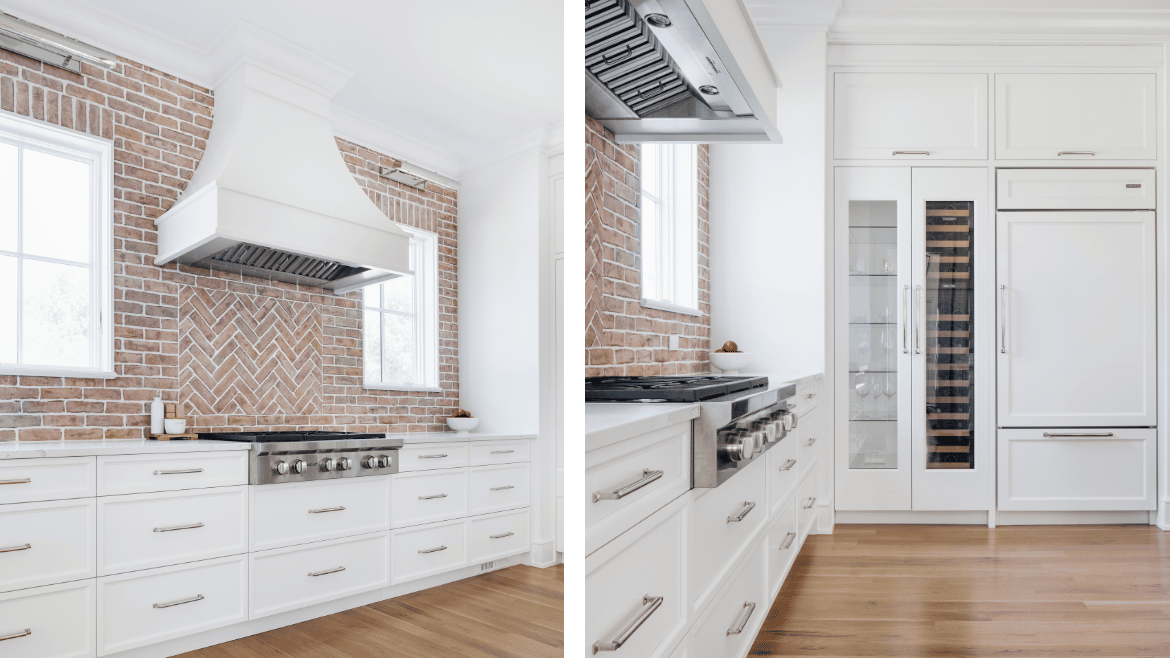 White-washed red brick kitchen backsplash under large white hood, tall wine refrigerator and glass storage