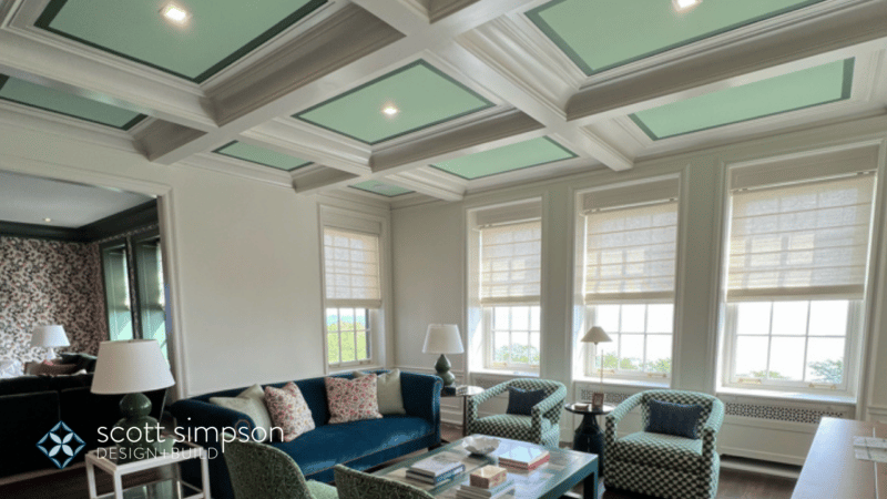 White living room with coffered ceiling with light green interiors condo remodel overlooking Lake Michigan